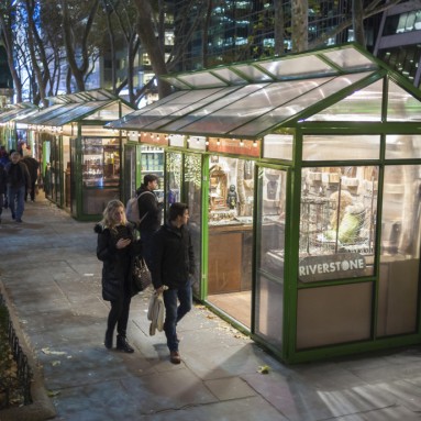 Visitors stroll through the Bryant Park Holiday Market